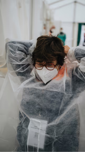 A non-emergency healthcare worker with a mask