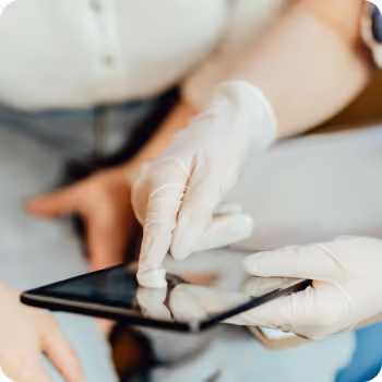A person interacting with a tablet.